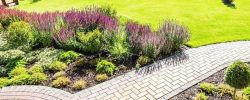 Modern garden design with paved patio and seating area in Newcastle