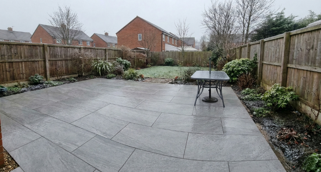 Porcelain paving resists water absorption, helping prevent frost damage and slippery surfaces during wet winter conditions.