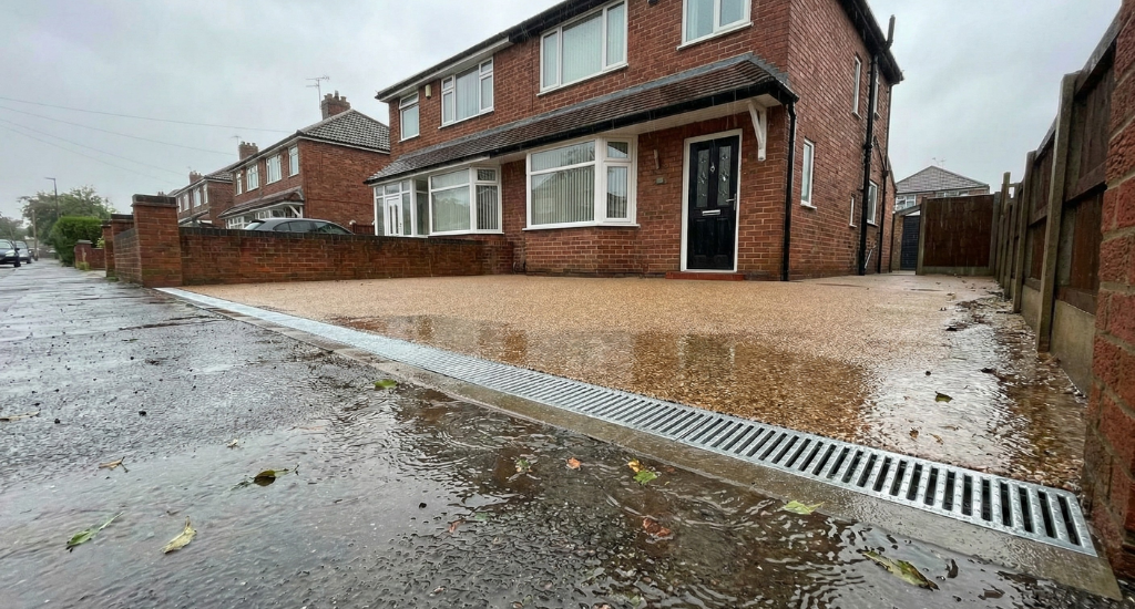 A correctly positioned channel drain is one of the most effective ways to manage surface water and protect the long-term integrity of any paved area.