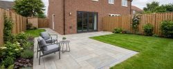 Newly installed patio with simple garden set