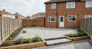 Newly finished patio with neat block edging and low garden steps in a Sunderland back garden