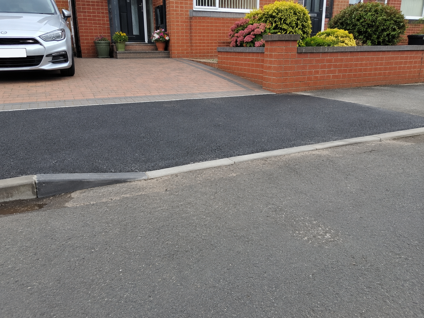Driveway with a kerb