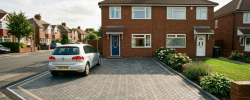 Freshly laid block paving driveway at a Newcastle home in late summer sunshine
