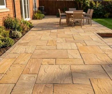 Riven Indian sandstone patio laid beside a red-brick North East home