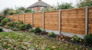 New fence with concrete posts and gravel boards in a North East garden