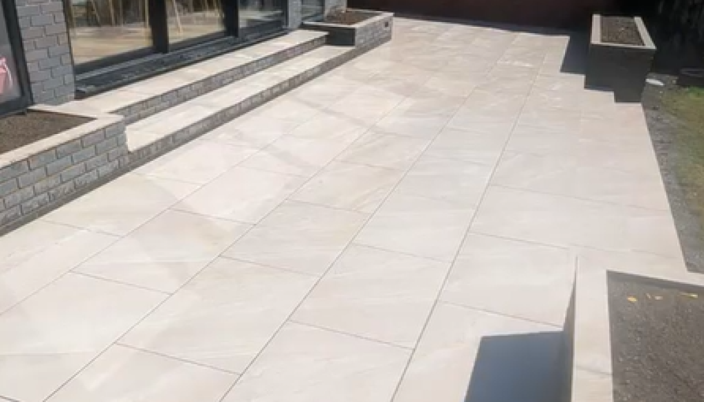 Porcelain patio paving beside a home
