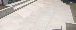 Porcelain patio paving beside a home
