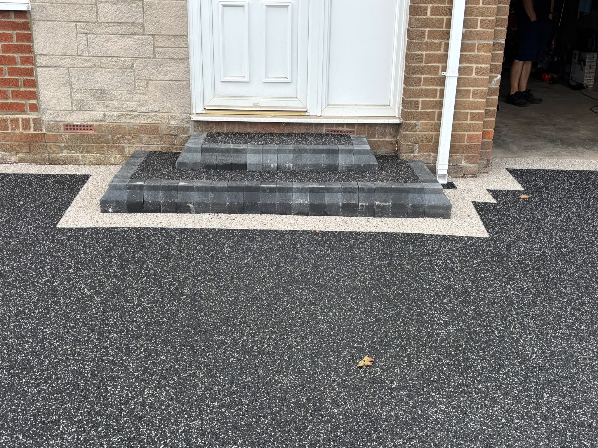 Resin finish and detailing around the front doorstep